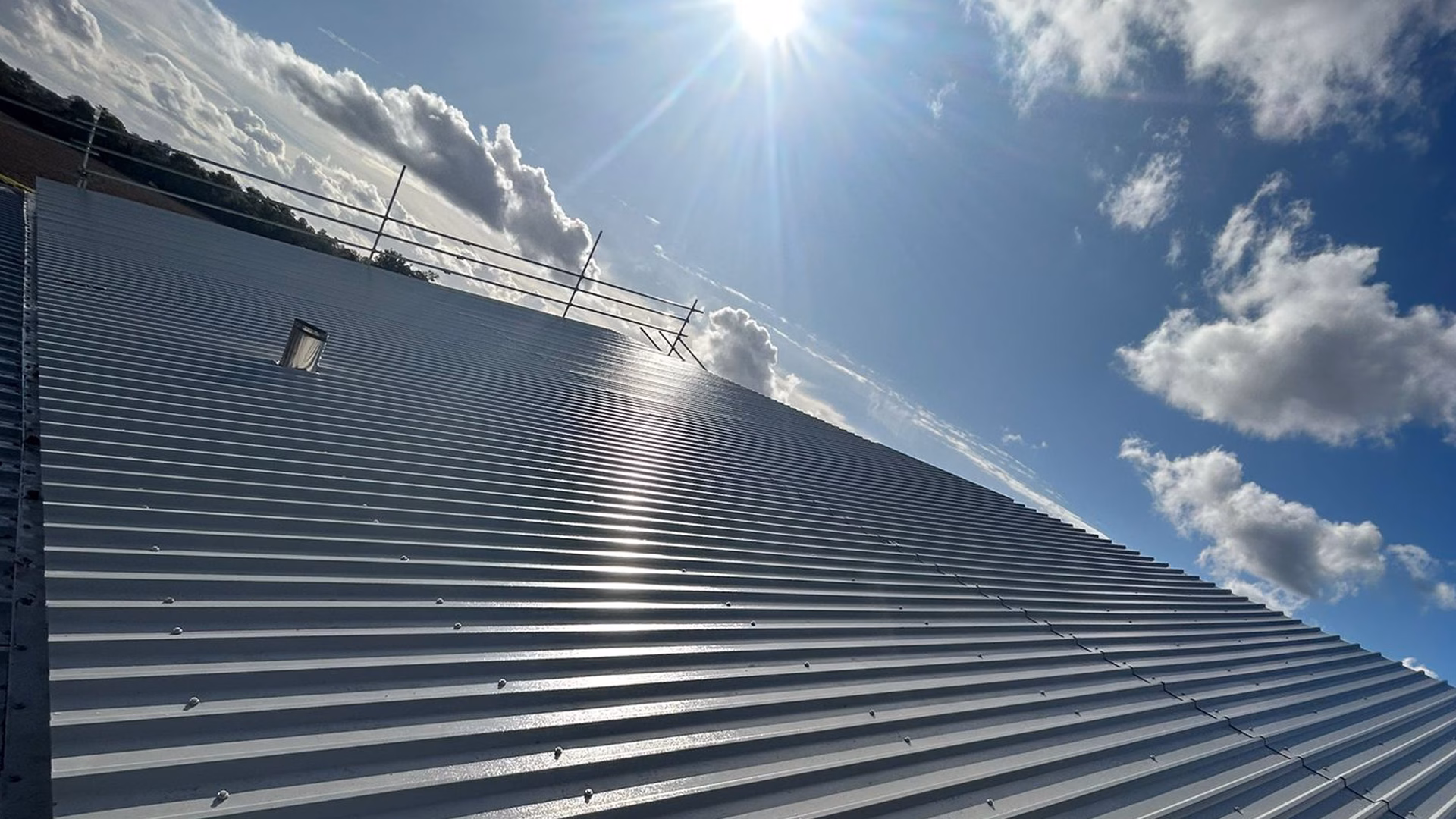 Completed metal roof overcladding system installed at Staplehurst Farm as part of a commercial roof upgrade project.