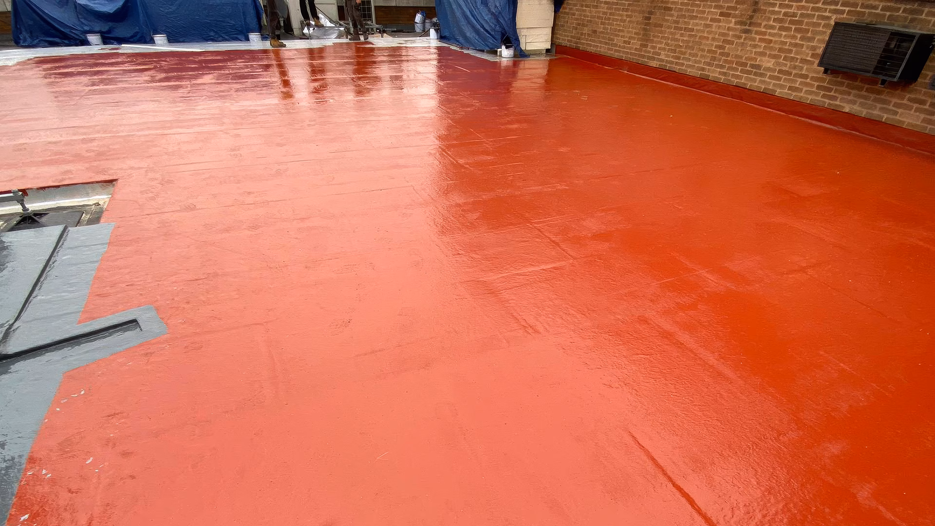 Adding the liquid roofing embedment coat
