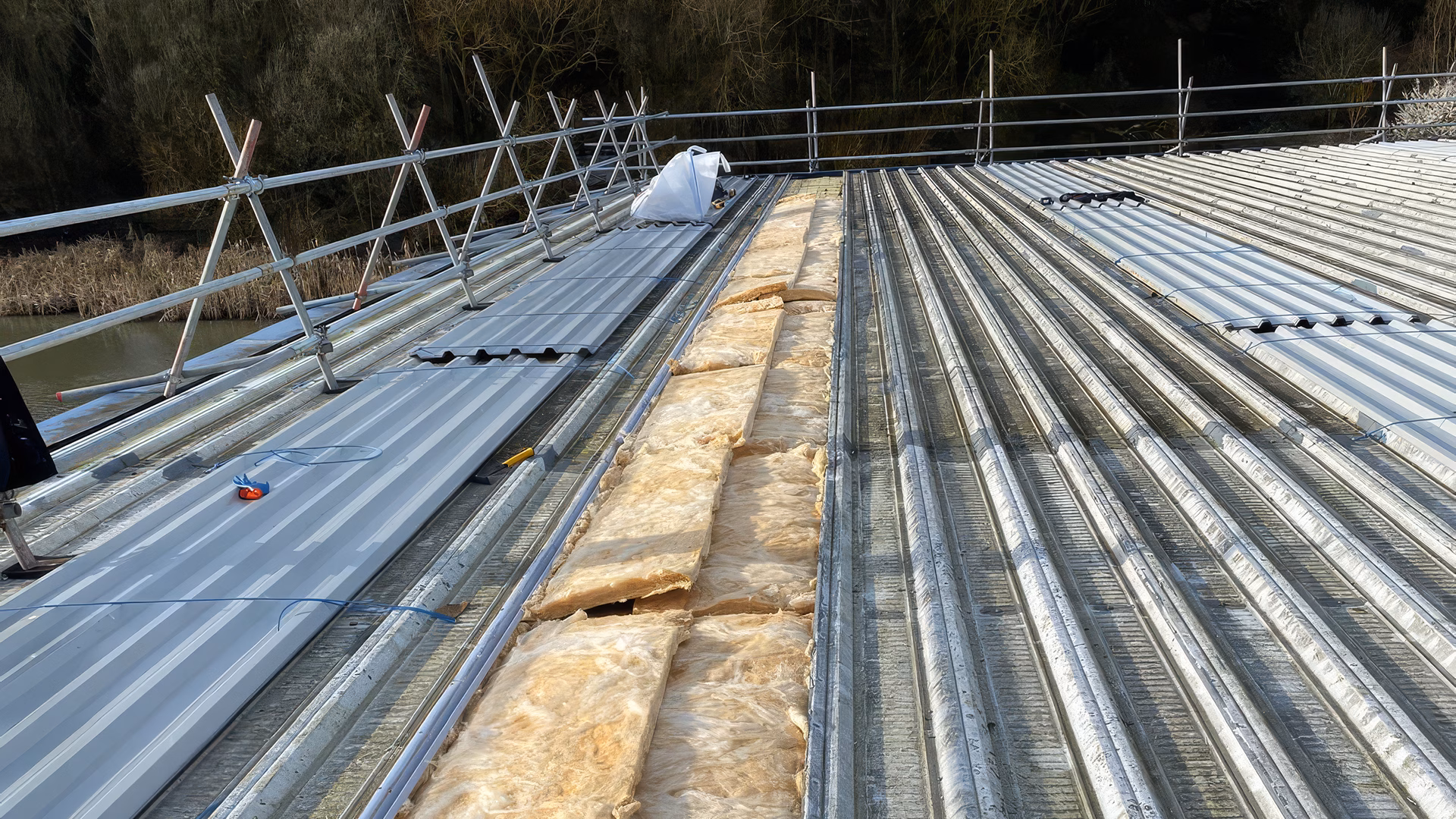 230mm insulation and new plastisol coated metal roofing sheets