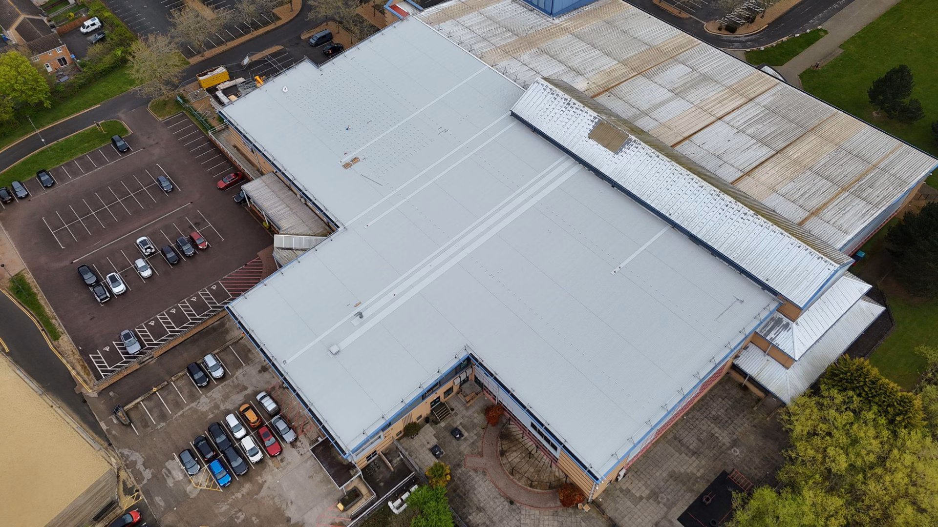 Completed metal roof refurbishment at Kettering Leisure Village, Northamptonshire