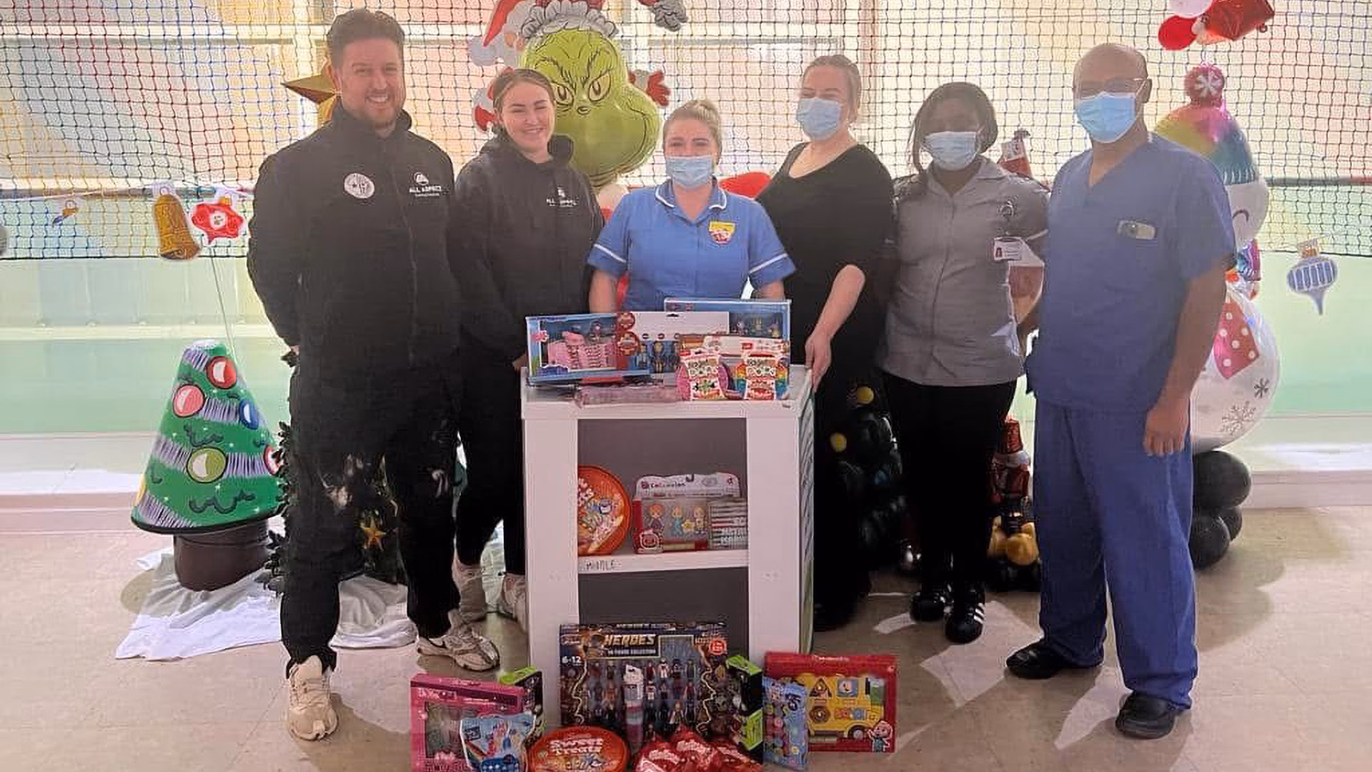 All Aspect team donating Christmas presents in the local community
